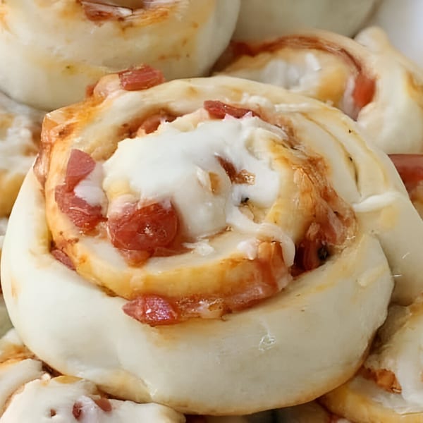 Close-up of Master's Pizza Pasta & Grill's pepperoni pizza roll with melted cheese and sauce.